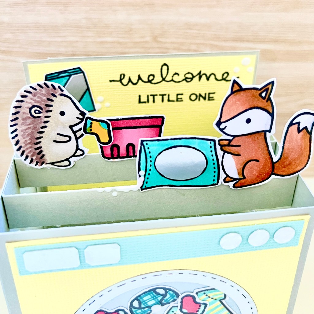 Lawn fawn cardmaking idea pop up card featuring critters from the smore the merrier stamp set