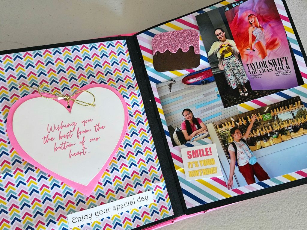 Colorful birthday-themed scrapbook page in shades of pink, blue, and yellow, perfect for a special girl.
